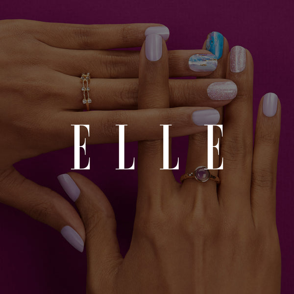 Elle featuring GLOSS Violet Moonstone gel nail strips.