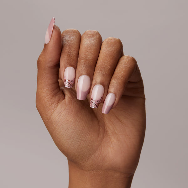 Long length, coffin shape, glossy finish. Semi-sheer nude press-on gel nails featuring tan french tips & swirled marble accents.