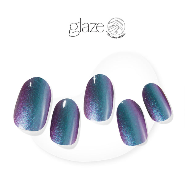 Dashing Diva GLAZE iridescent blue and purple semi cured gel nail strips with a shimmer finish.