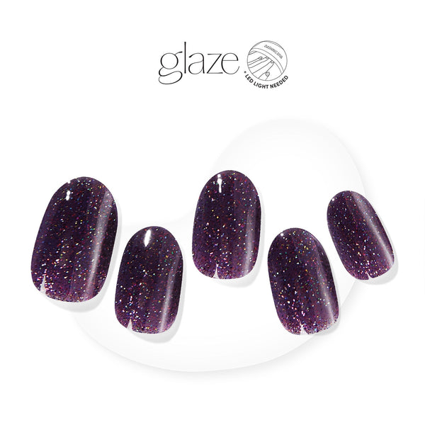 Dashing Diva GLAZE deep purple semi cured gel nail strips with multi color glitter.