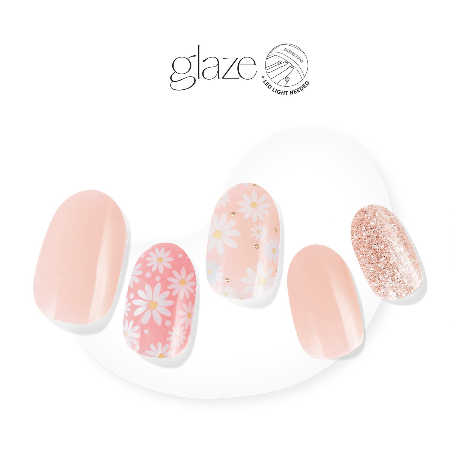 Dashing Diva GLAZE baby pink semi cured gel nail strips with daisy floral print and glitter accents.