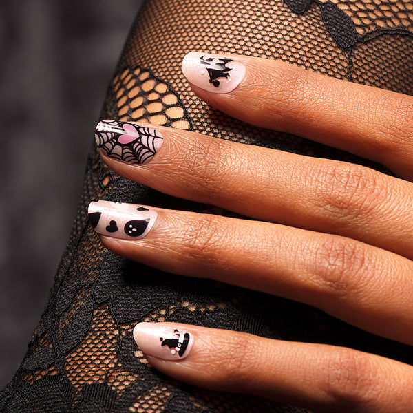 Basic Witch With Dashing Diva nail stickers. Black and pink designs with web and spooky accents 