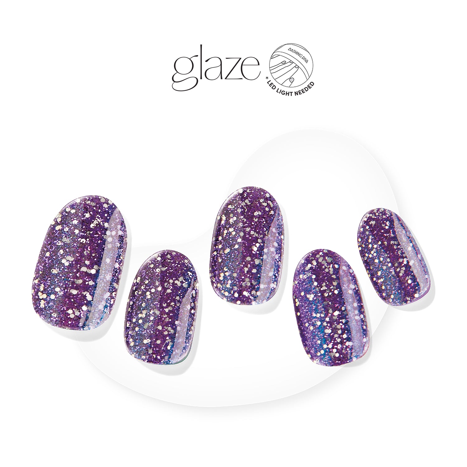 It's getting haute in here... Semi-cured purple gel nail strips featuring gold glitter and an iridescent chrome finish with mega volume & maximum shine.