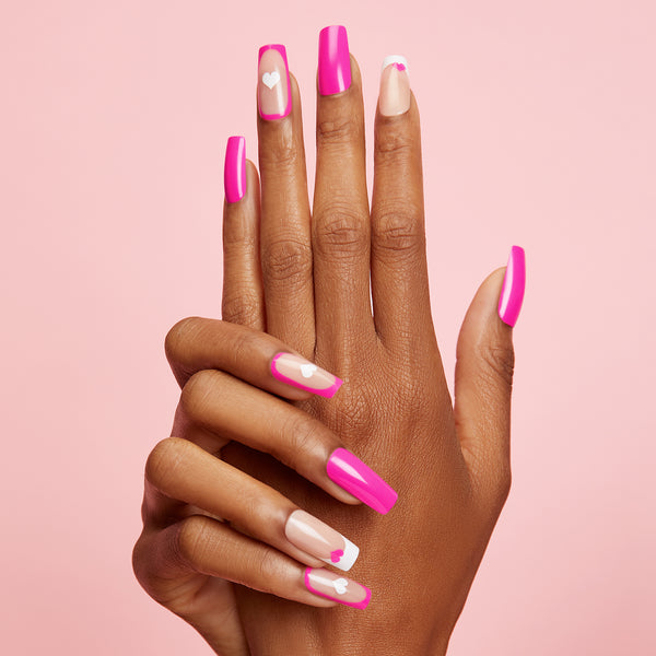 Long length, square shape, glossy finish. Sheer nude and hot pink glue-on gel nails featuring pink & white hearts and white french tips.