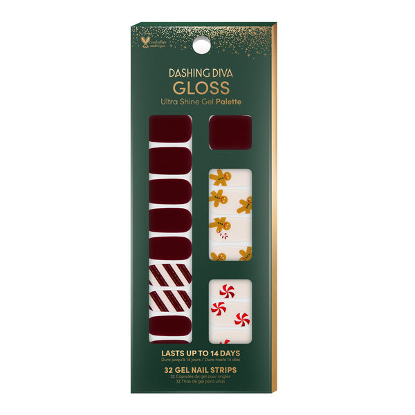 Deep red and cream nail strips featuring gingerbread, candy canes, mints, and stripes with a glossy, high-shine finish.