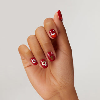 Premium nail art stickers featuring santa, reindeer, candy canes, stockings, santa hat french tips, and so much more!