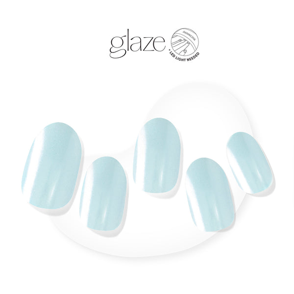 Semi-cured baby blue gel nail strips featuring a shimmery chrome finish with mega volume & maximum shine. 