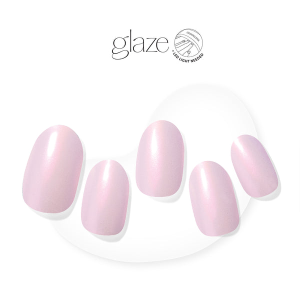  Semi-cured iridescent baby pink gel nail strips featuring a shimmery chrome finish with mega volume & maximum shine. 