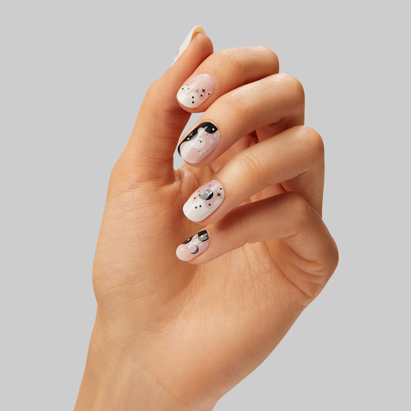  Do you, boo. Semi-cured sheer baby pink gel nail strips featuring black & white scalloped accents, ghost icons, and silver foil moons & stars with mega volume & maximum shine.