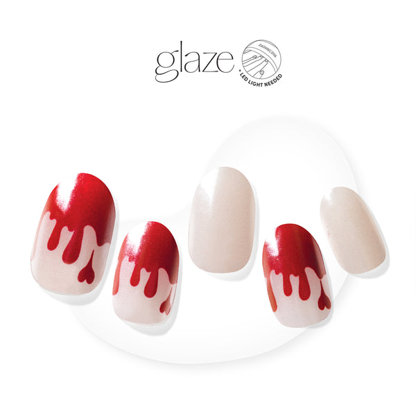  Semi-cured clear gel nail strips featuring a shimmery velvet effect and red blood-dripping french tips with mega volume & maximum shine.
