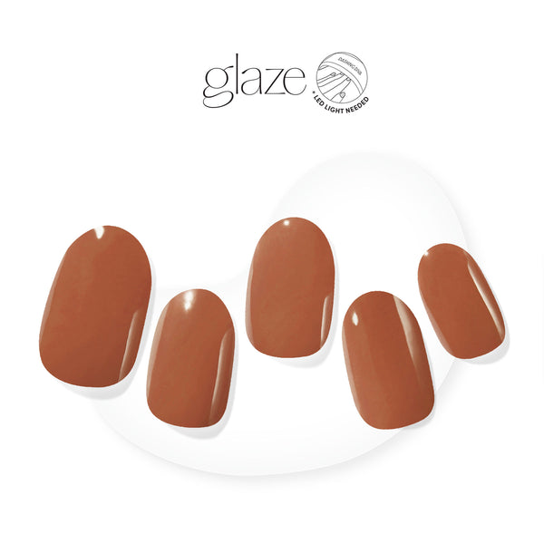 Semi-cured, warm, cinnamon brown gel nail strips with mega volume & an opaque finish.
