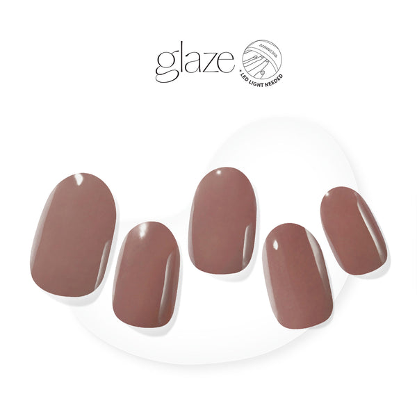 Semi-cured, cool, creamy brown gel nail strips with mega volume & an opaque finish.