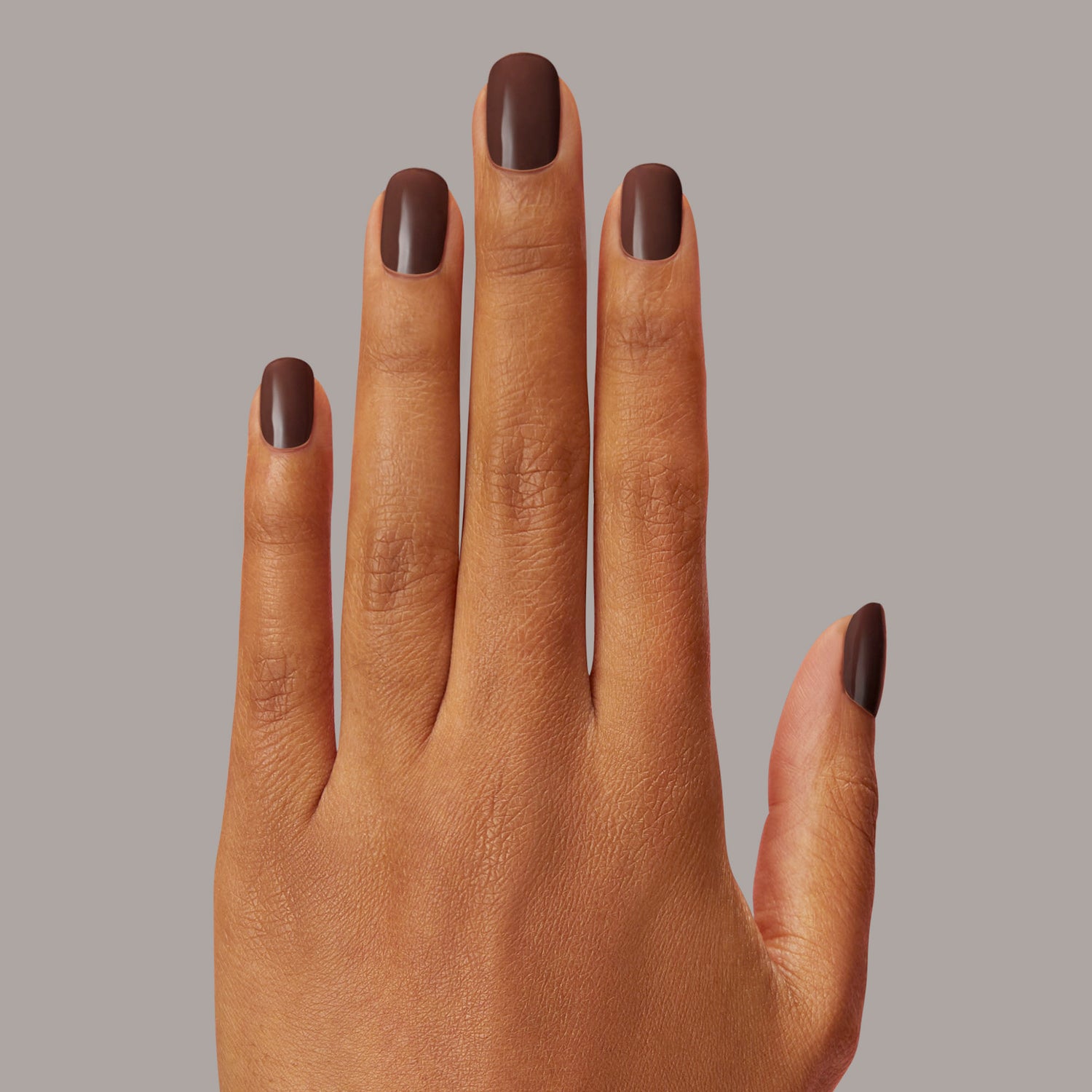 Semi-cured, rich dark brown gel nail strips with mega volume & an opaque finish.