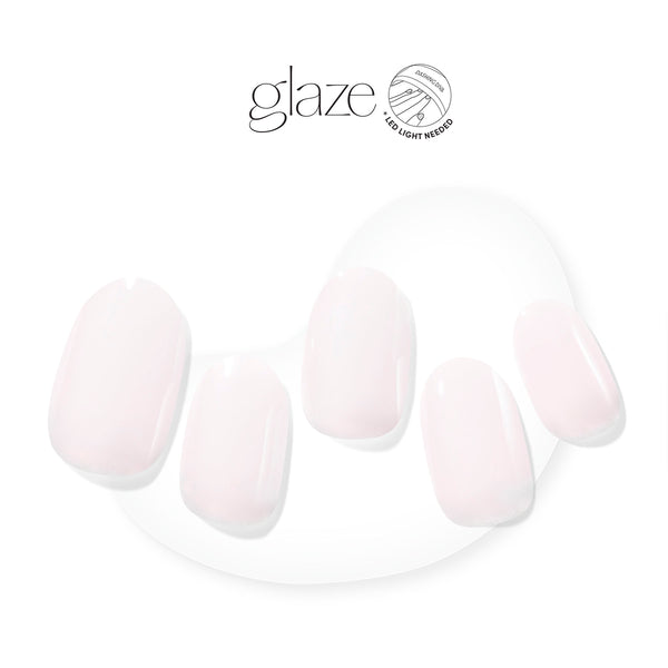  Semi-cured, cool, baby pink gel nail strips with mega volume & a sheer finish.