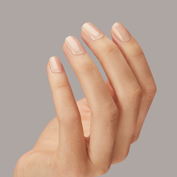 Semi-cured, soft tan gel nail strips with mega volume & a sheer finish.