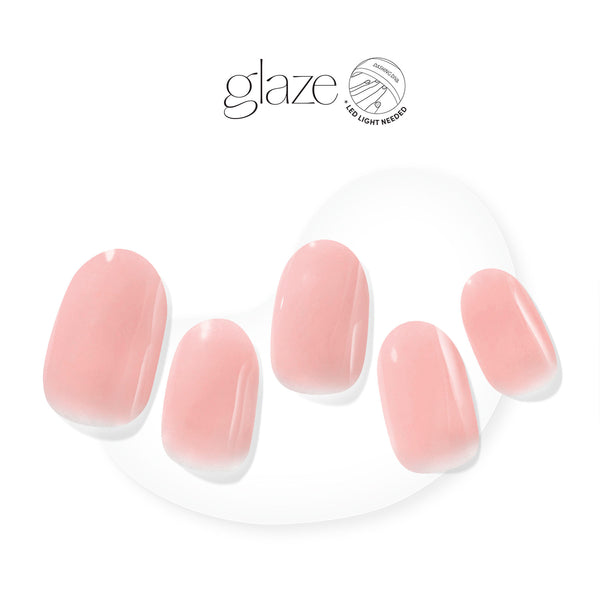 Semi-cured, warm rose gel nail strips with mega volume & a sheer finish.
