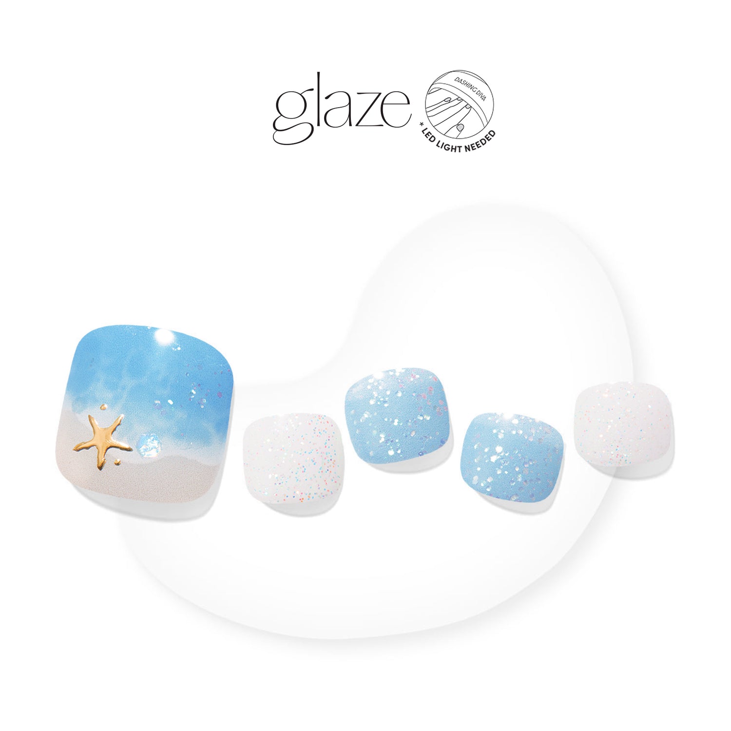 Semi-cured blue & white gel pedicure strips featuring iridescent glitter, 3D gold starfish, and detailed ocean artwork with mega volume & maximum shine.