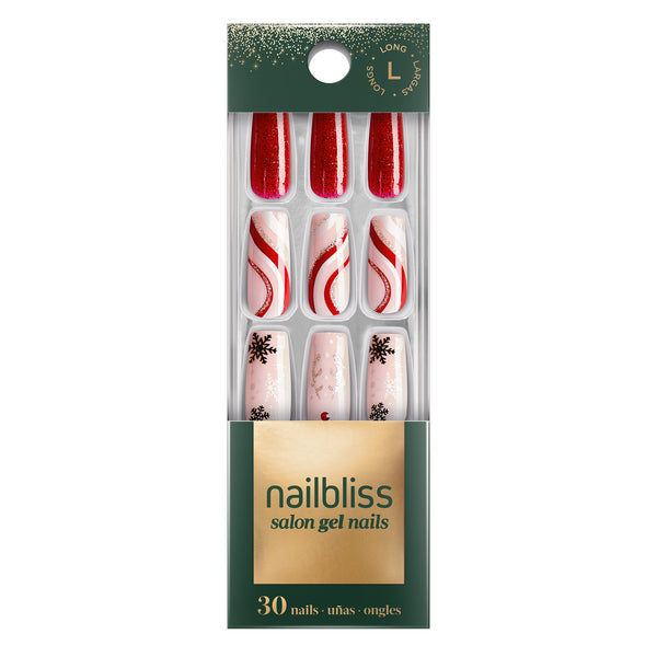 Long length, square shape, glossy finish. Nude pink & glittered red glue-on gel nails featuring abstract swirls, champagne glitter, snowflakes, red nose rhinestones, and antler accents.