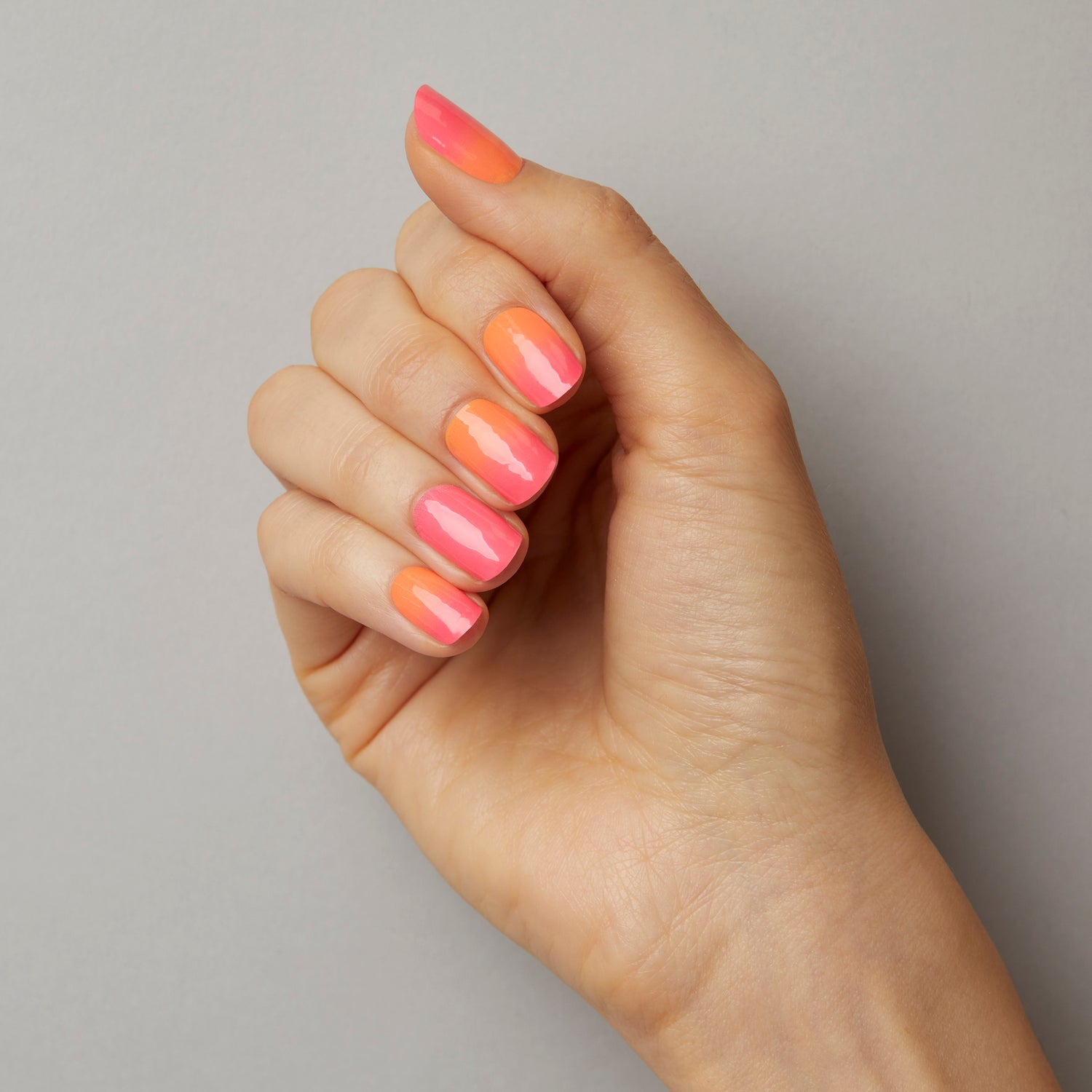Pink & orange ombré gel nail strips with a double gel formula for an ultra-smooth finish.