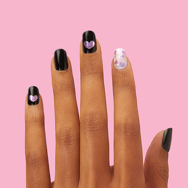 Semi-cured black gel nail strips featuring reflective purple hearts