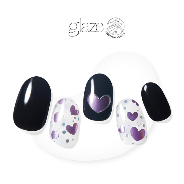 Semi-cured black gel nail strips featuring reflective purple hearts