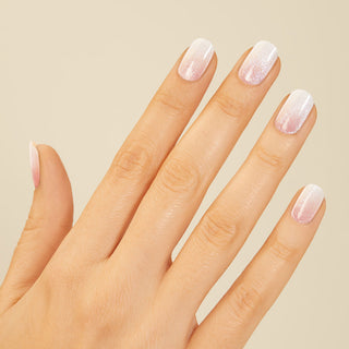 Semi-cured white ombré gel nail strips featuring velvet shimmer with mega volume and maximum shine.