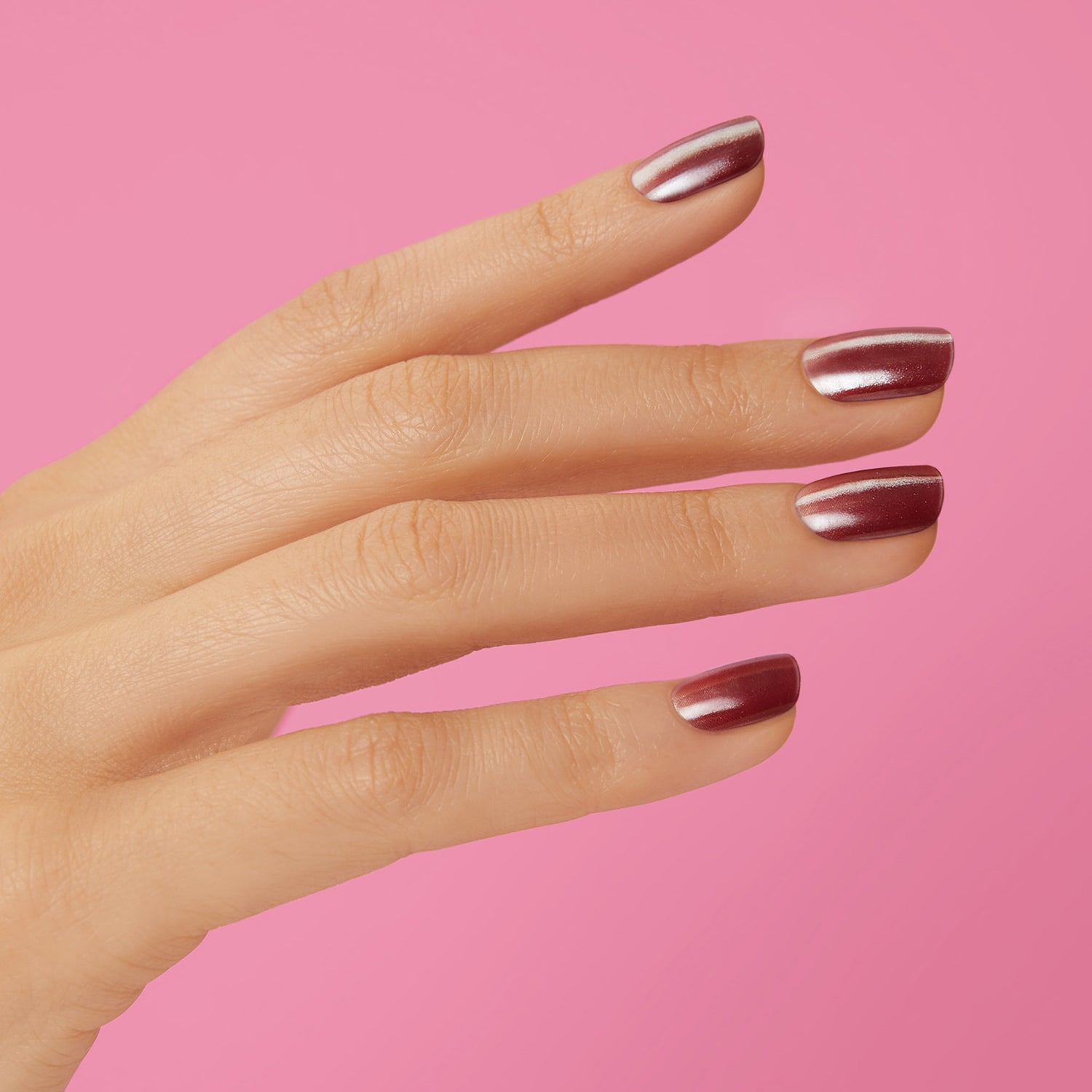 Semi-cured, soft plum, ombré gel nail strips featuring a shimmery chrome finish with mega volume & maximum shine.