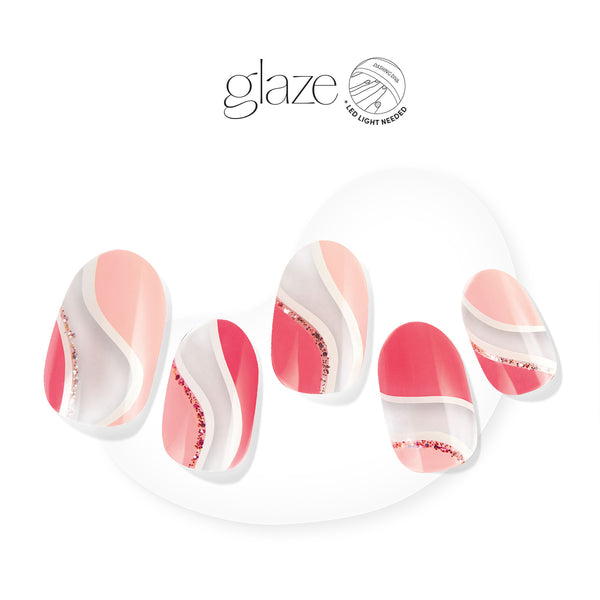 Dashing Diva GLAZE clear semi cured gel nail strips with dark and light pink abstract wave accents and glitter.