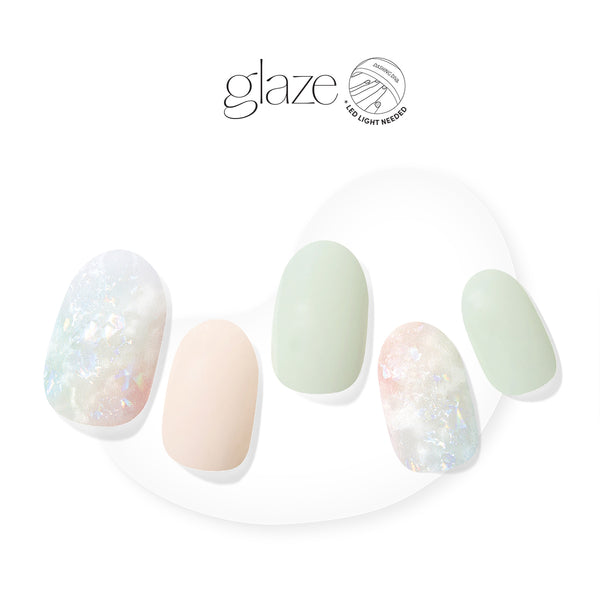 Dashing Diva GLAZE light green semi cured gel nail strips with multicolor mosaic accents.