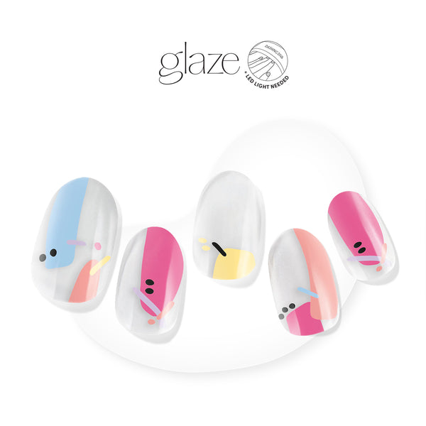 Dashing Diva GLAZE clear semi cured gel nail strips with multi color abstract accents.