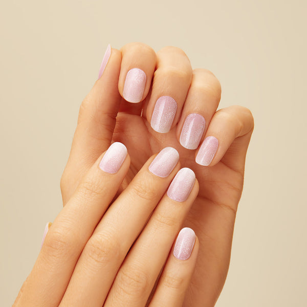  White to pink ombré gel nail strips featuring velvet shimmer with a double gel formula for an ultra-smooth finish.