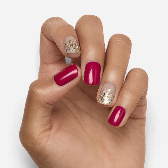 hot pink nails with gold glitter
