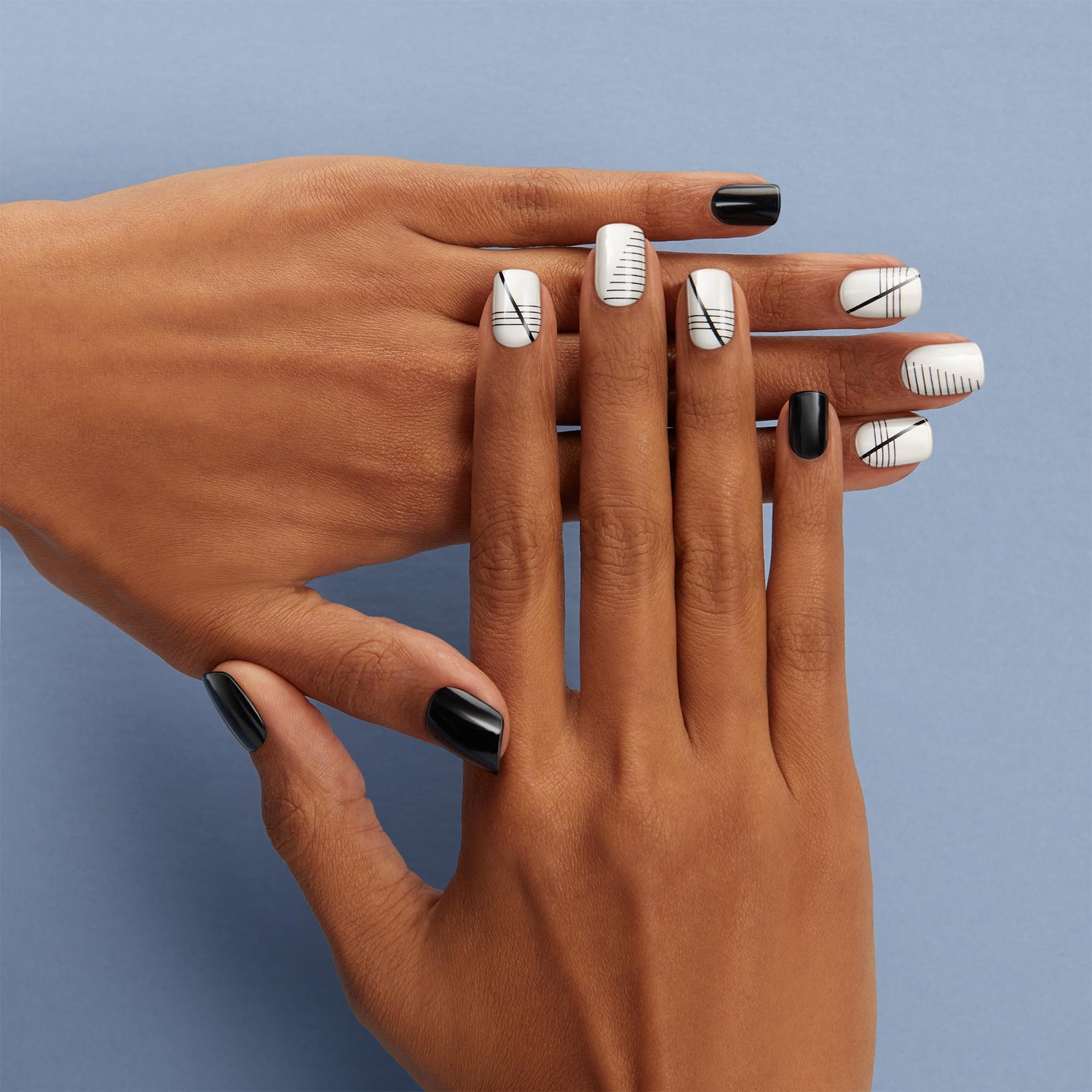 Medium length, square shape, glossy finish black & white press-on gel nails