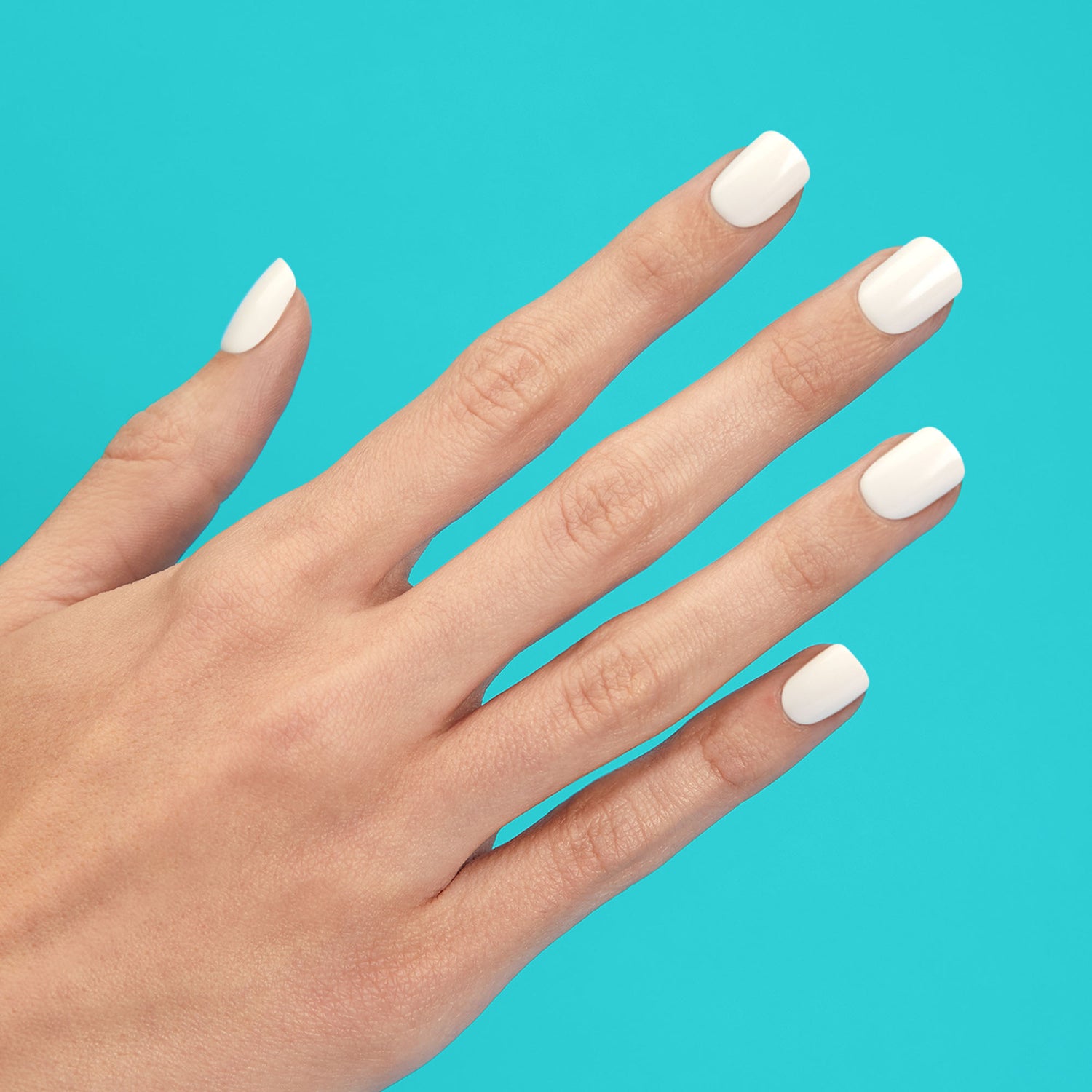 Medium length, square shape, glossy finish white press-on gel nails.