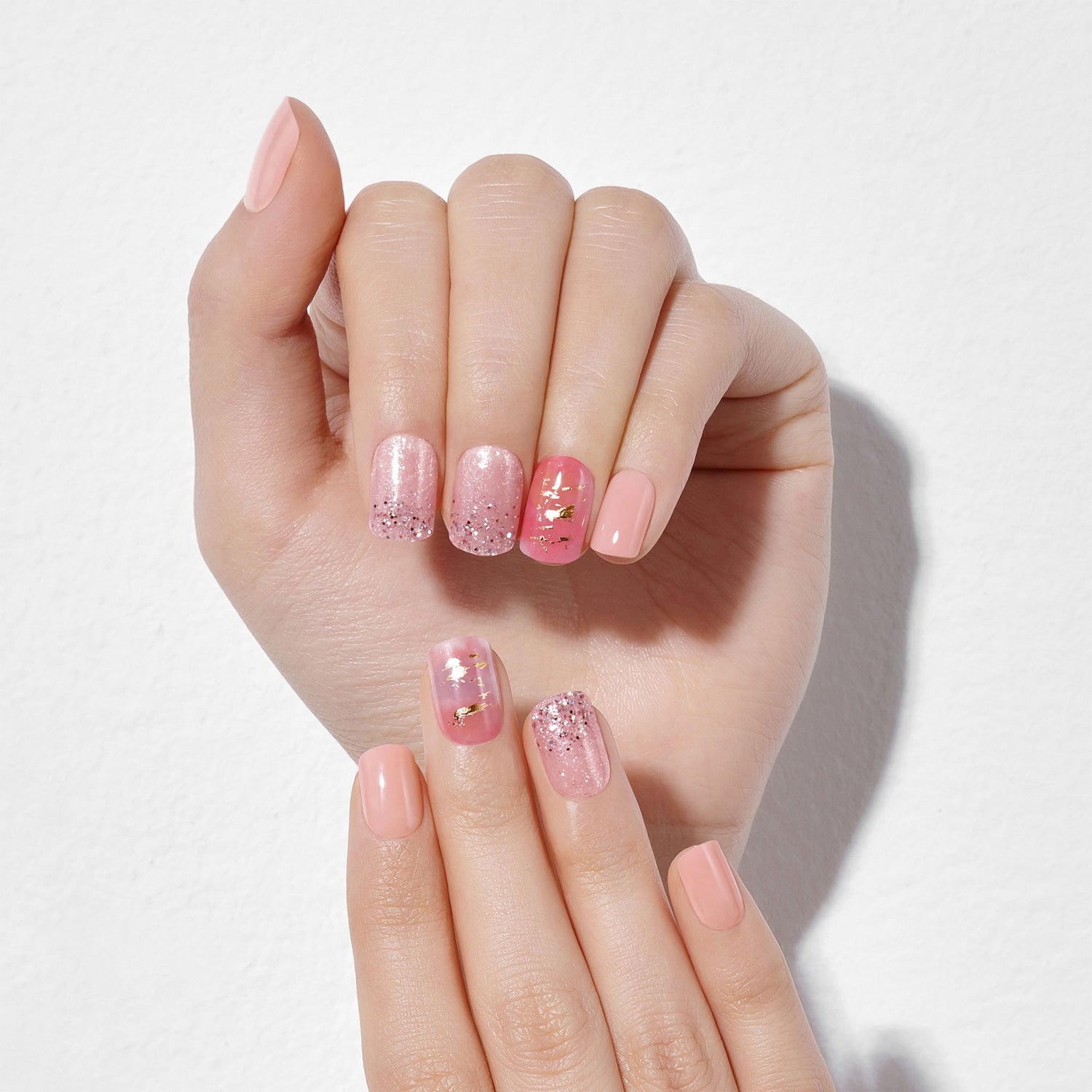 Medium length, square shape, glossy finish pink & nude pink press-on gel nails.