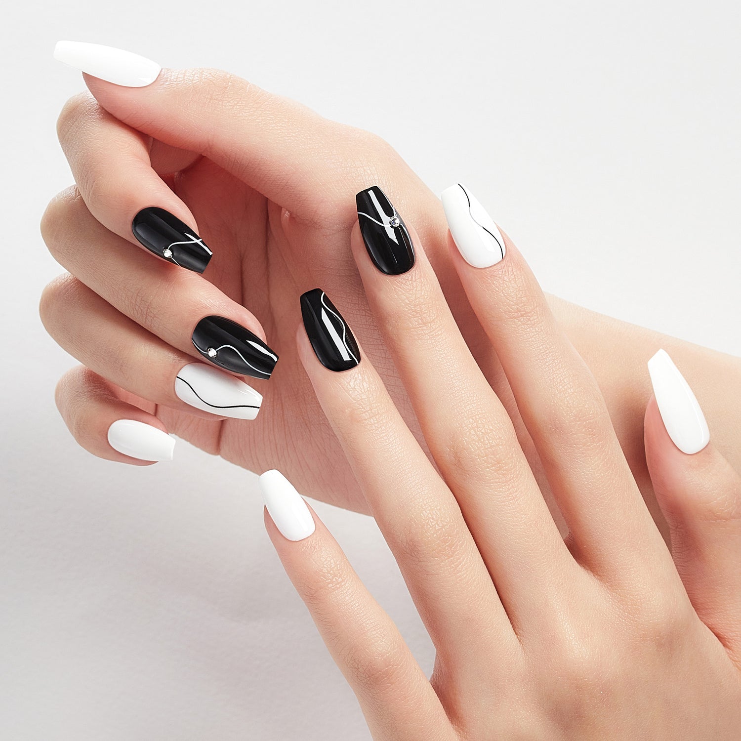Long length, coffin shape, glossy finish black & white press-on gel nails 