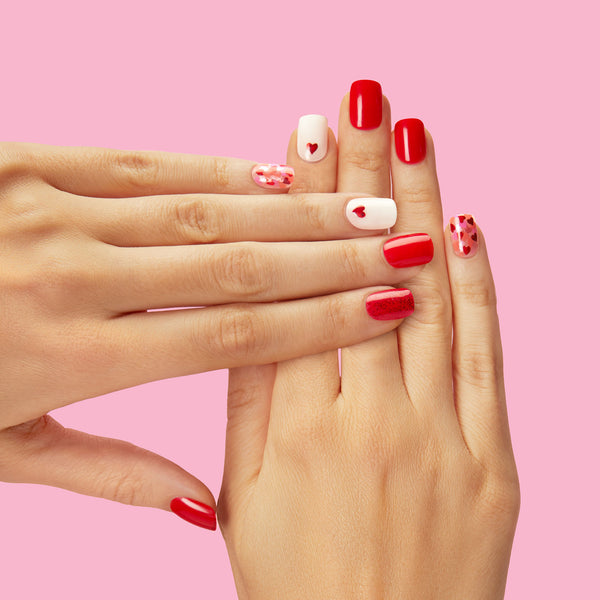 Short length, square shape, glossy finish red, and white press-on nails. 