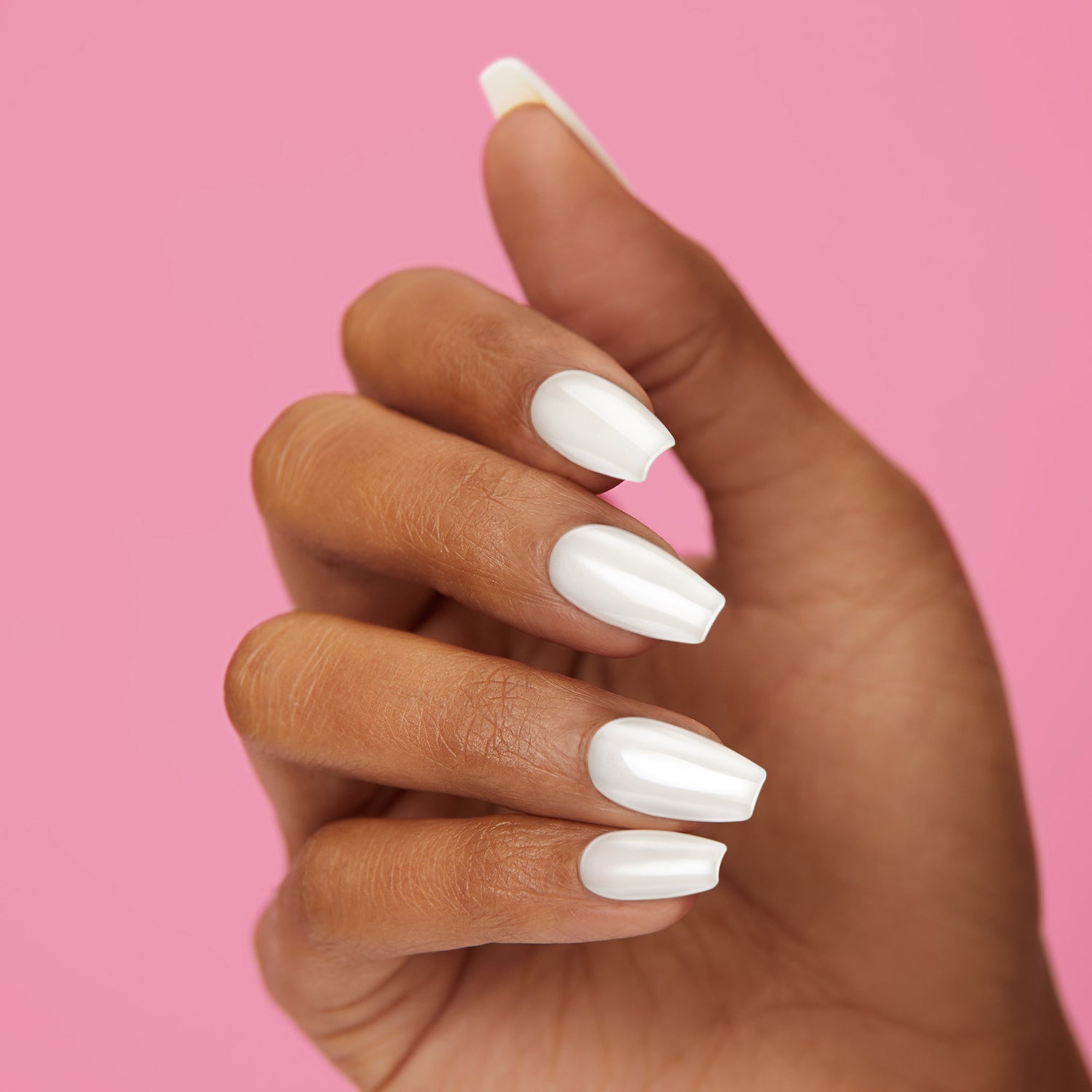  White press-on gel nails featuring, long length, coffin shape, and a shimmery chrome finish.