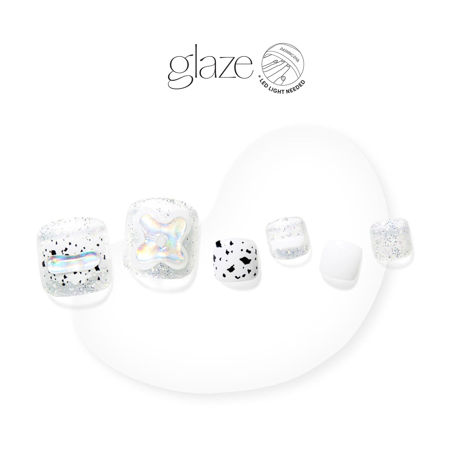Dashing Diva GLAZE semi-cured white and clear gel pedicure strips with speckle accents.