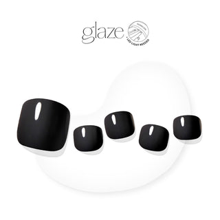 Dashing Diva GLAZE black semi-cured gel pedicure nail strips.